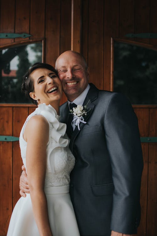 Photo of Couple Smiling Together