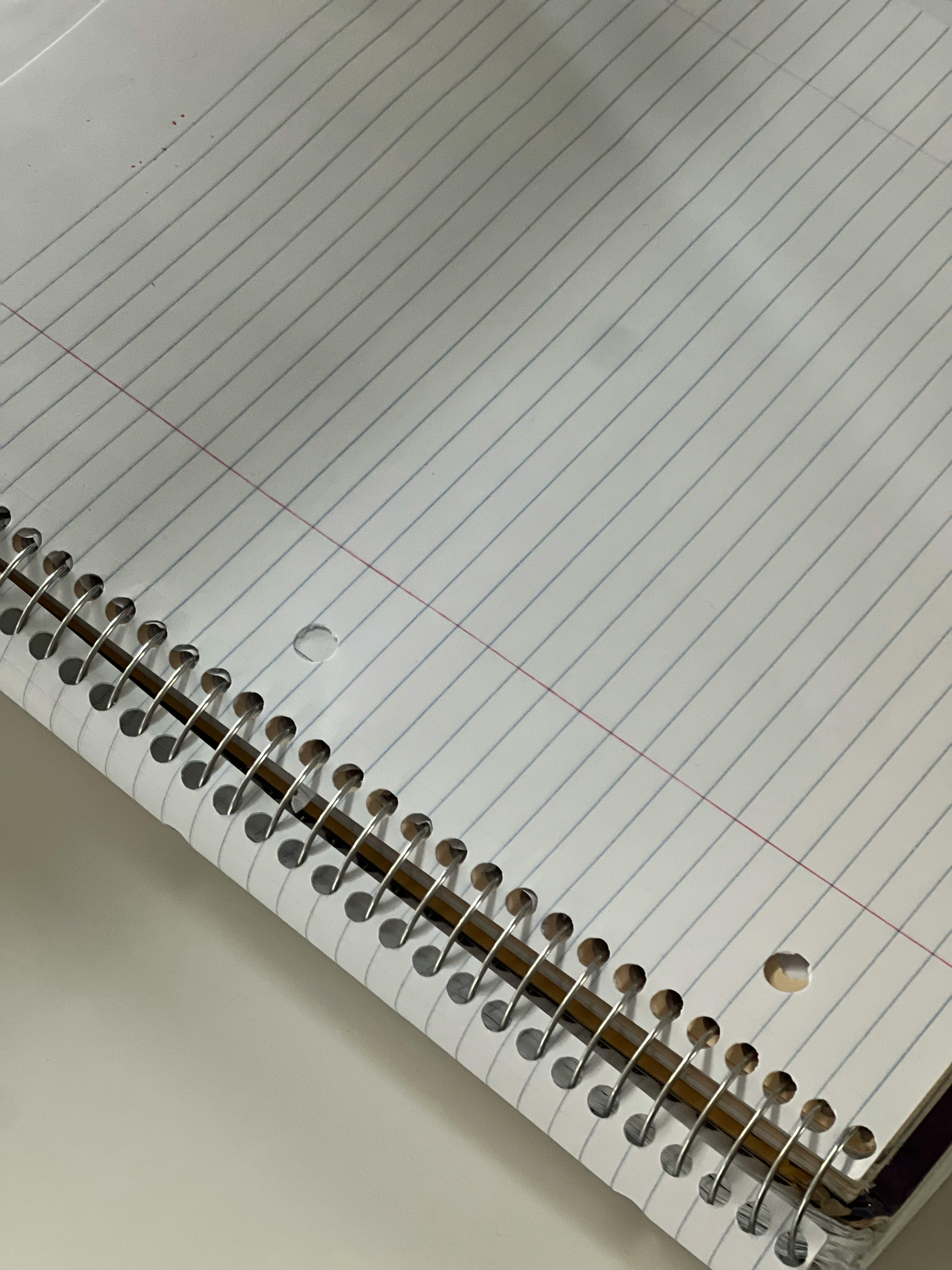 a notebook with a spiral bound notebook