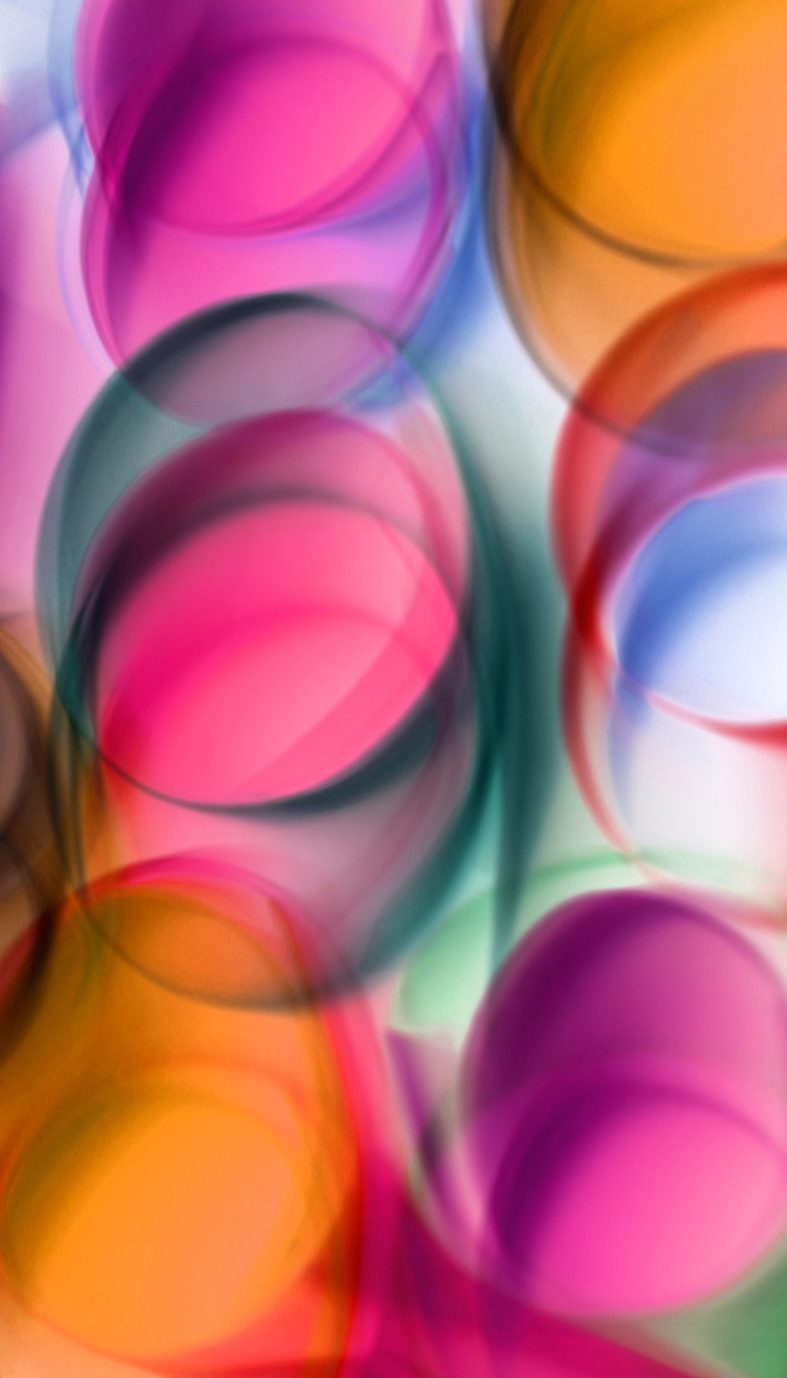 Vibrant abstract image featuring colorful circles with motion blur effect.