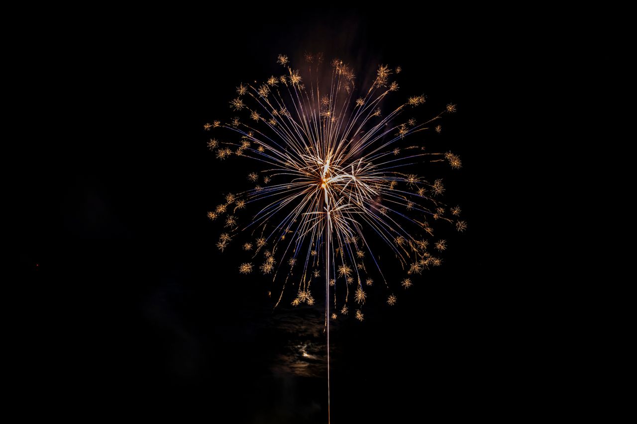 a stunning firework illuminating the night sky perfect for celebration