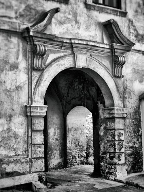 Grayscale Photo of Concrete Building