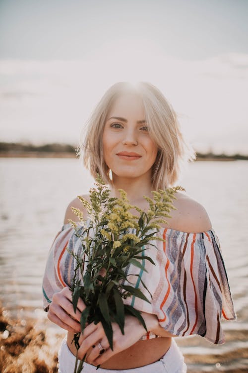 Free Woman Holding Flower Stock Photo