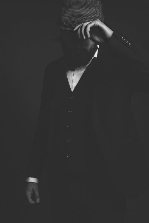 Monochrome Photo of Man Wearing Tuxedo