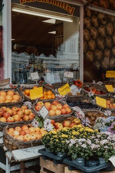 Basket-laden fruit stall showcasing vibrant produce at an outdoor market in Bremen, Germany.