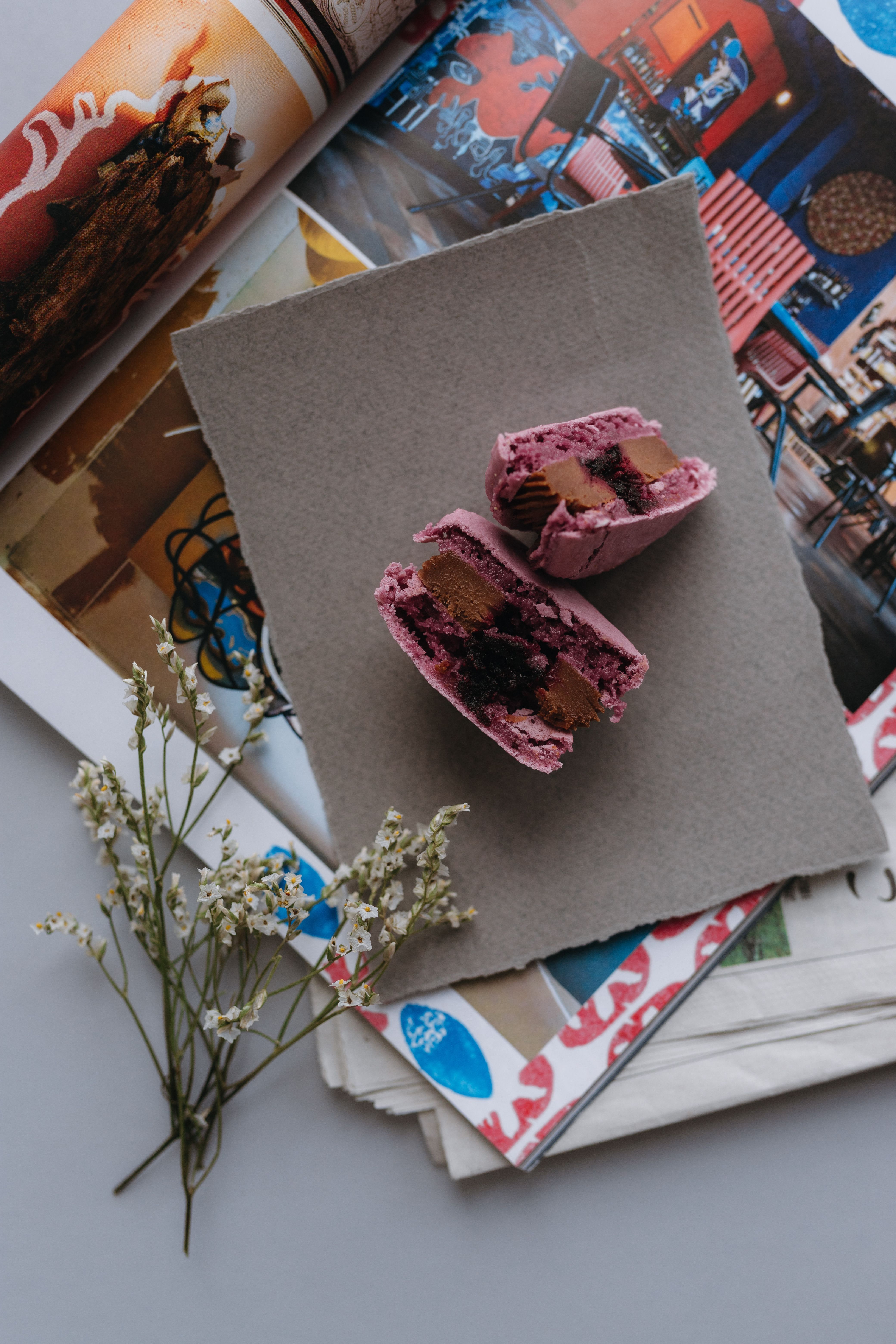 A magazine with a picture of a cake and flowers · Free Stock Photo