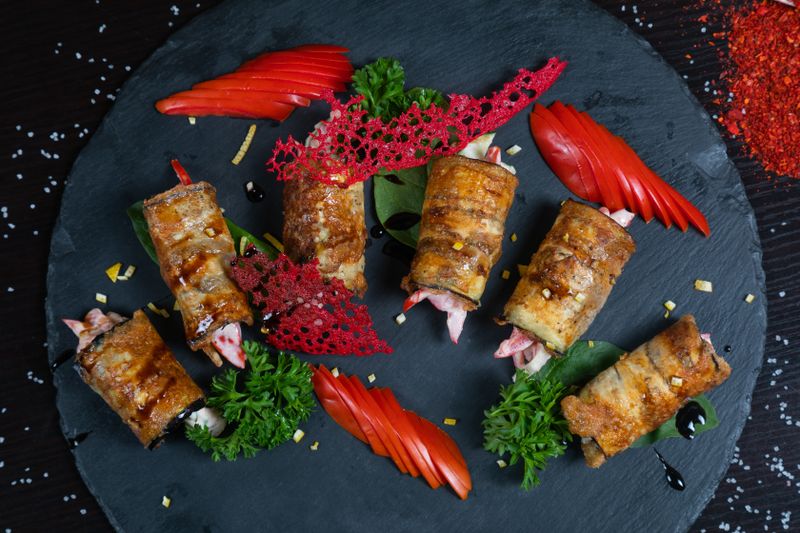 rolled oat and date energy bites on a plate