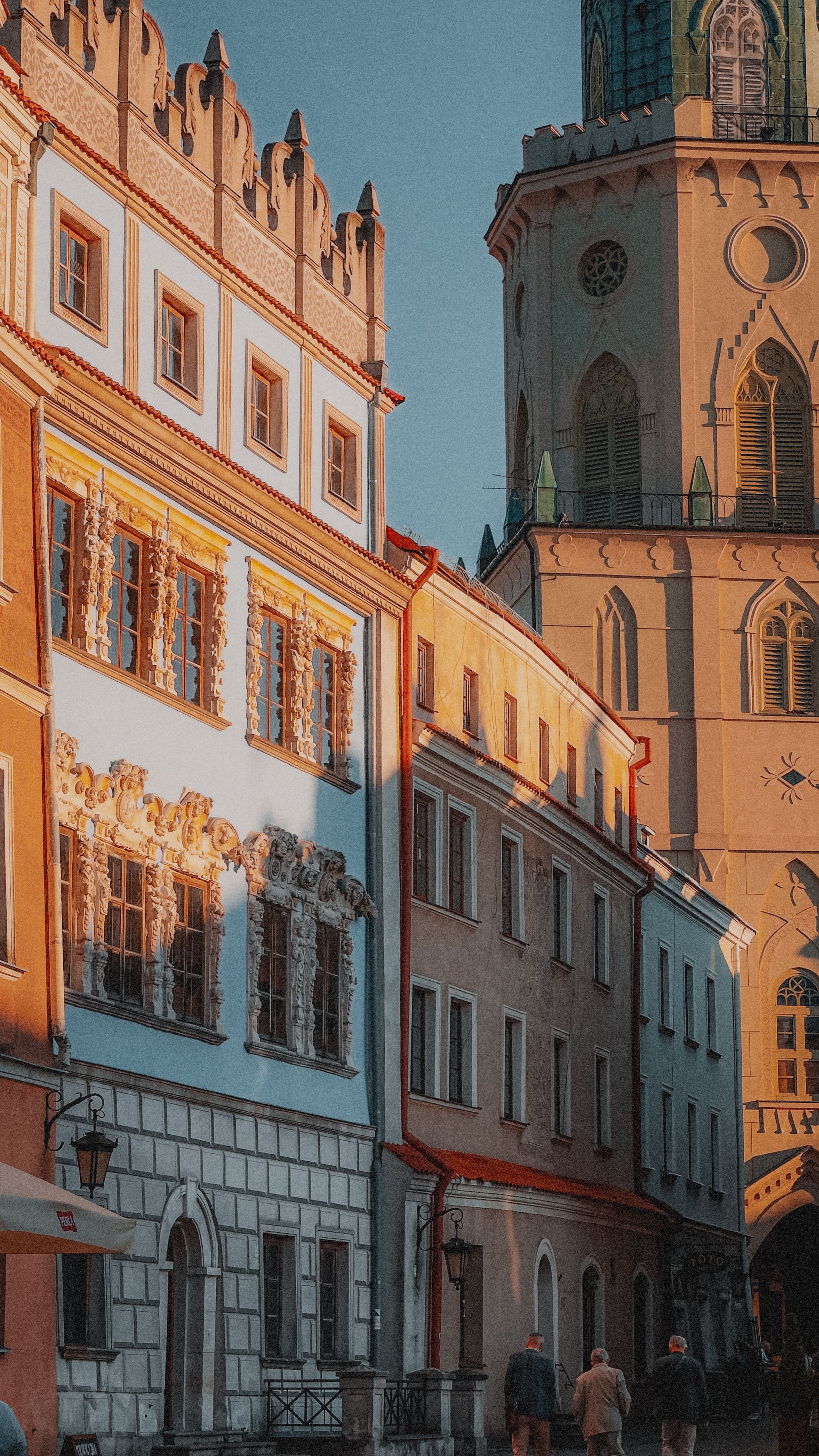 A photo of a city street with a clock tower · Free Stock Photo