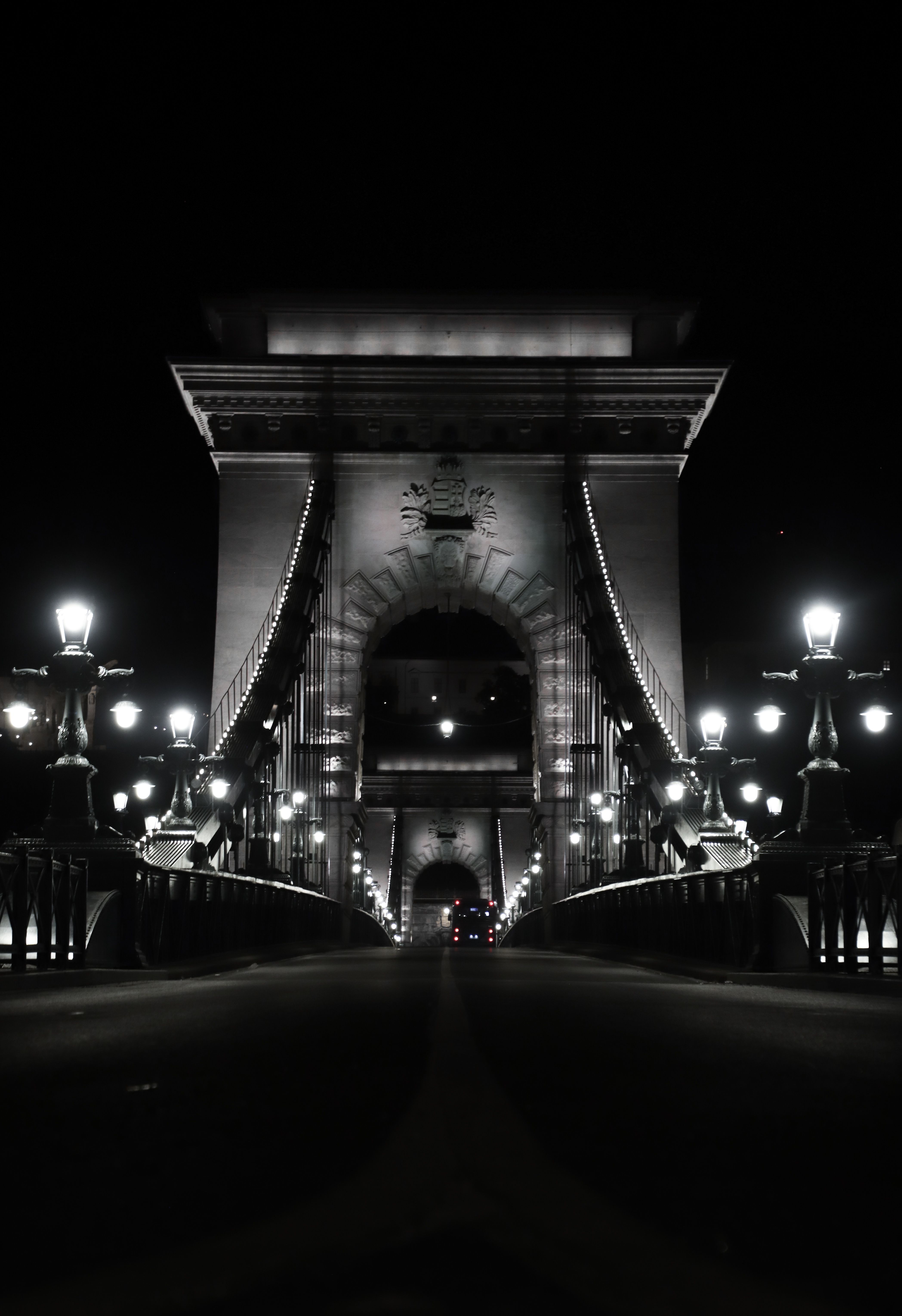 Majestic night view of the illuminated Széchenyi Chain Bridge in Budapest, Hungary.