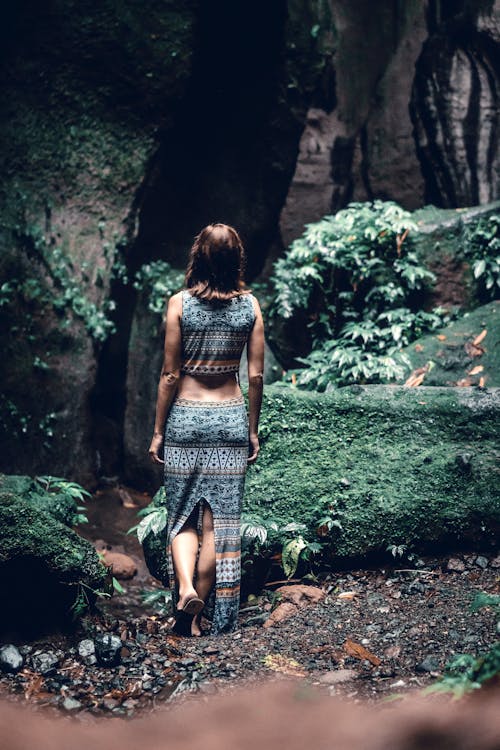 Woman in Blue Sleeveless Crop-top