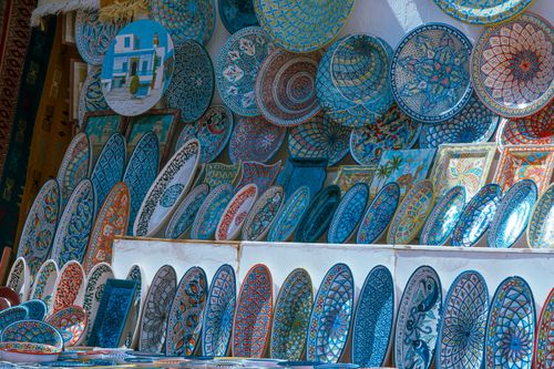 Free Vibrant collection of Tunisian ceramics on display in Carthage, showcasing intricate handmade designs. Stock Photo