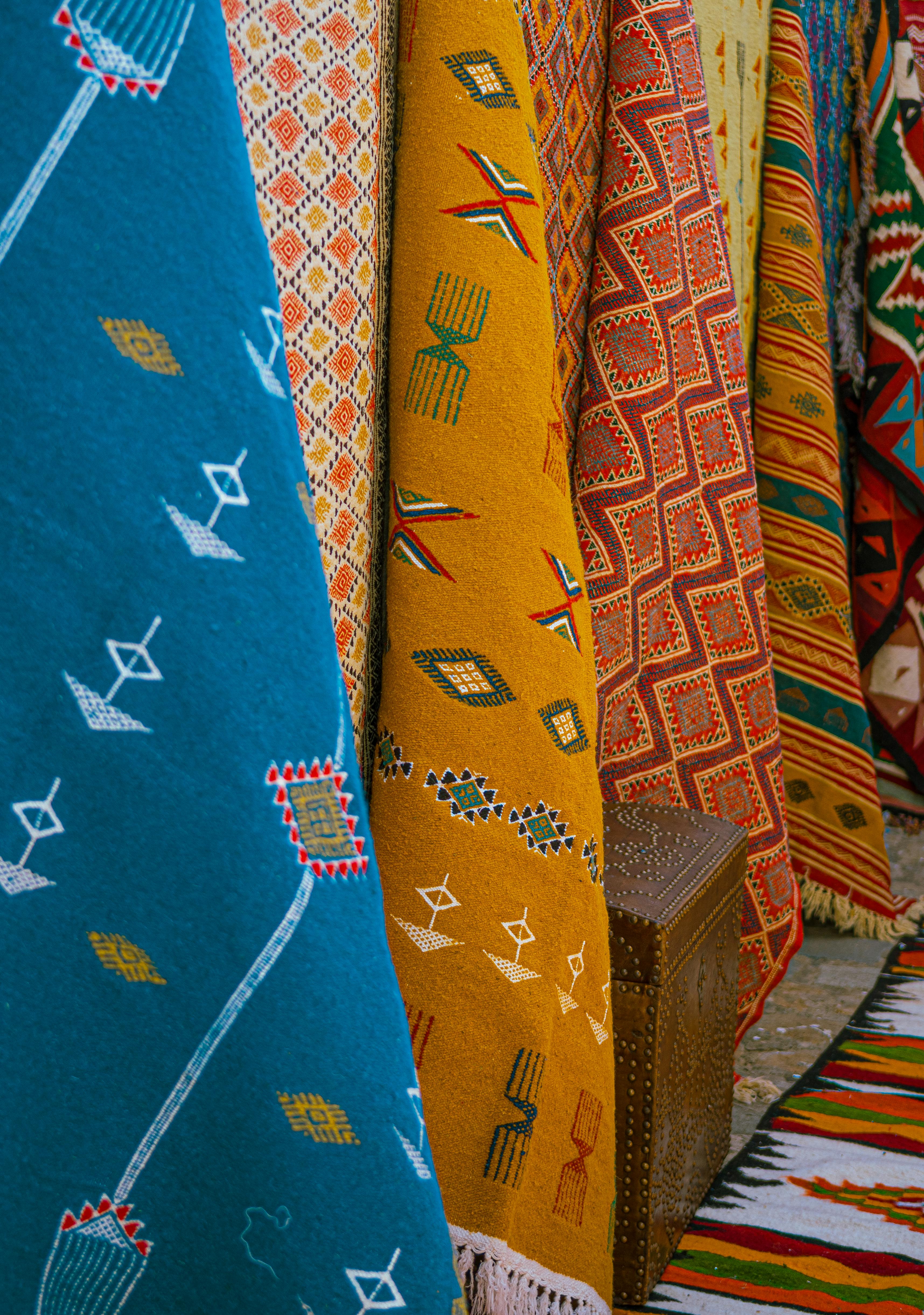 Free Vibrant handmade Tunisian carpets showcasing intricate patterns and cultural heritage. Stock Photo