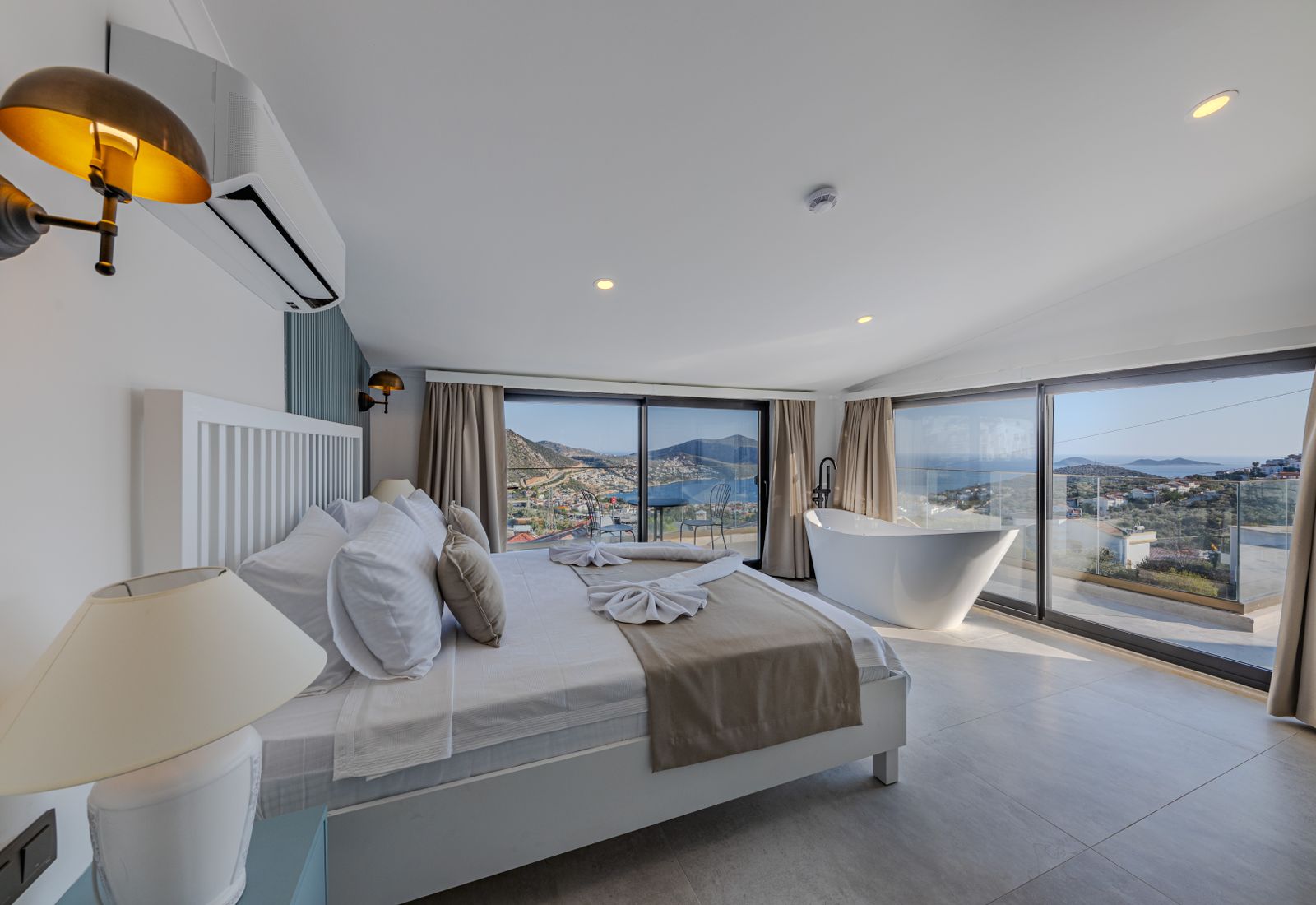 Ocean view suite with a serene bedroom and panoramic sea view