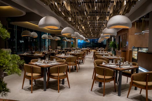 Explore a chic and contemporary restaurant interior in Sulaymaniyah, defined by elegant design and sophisticated ambiance.