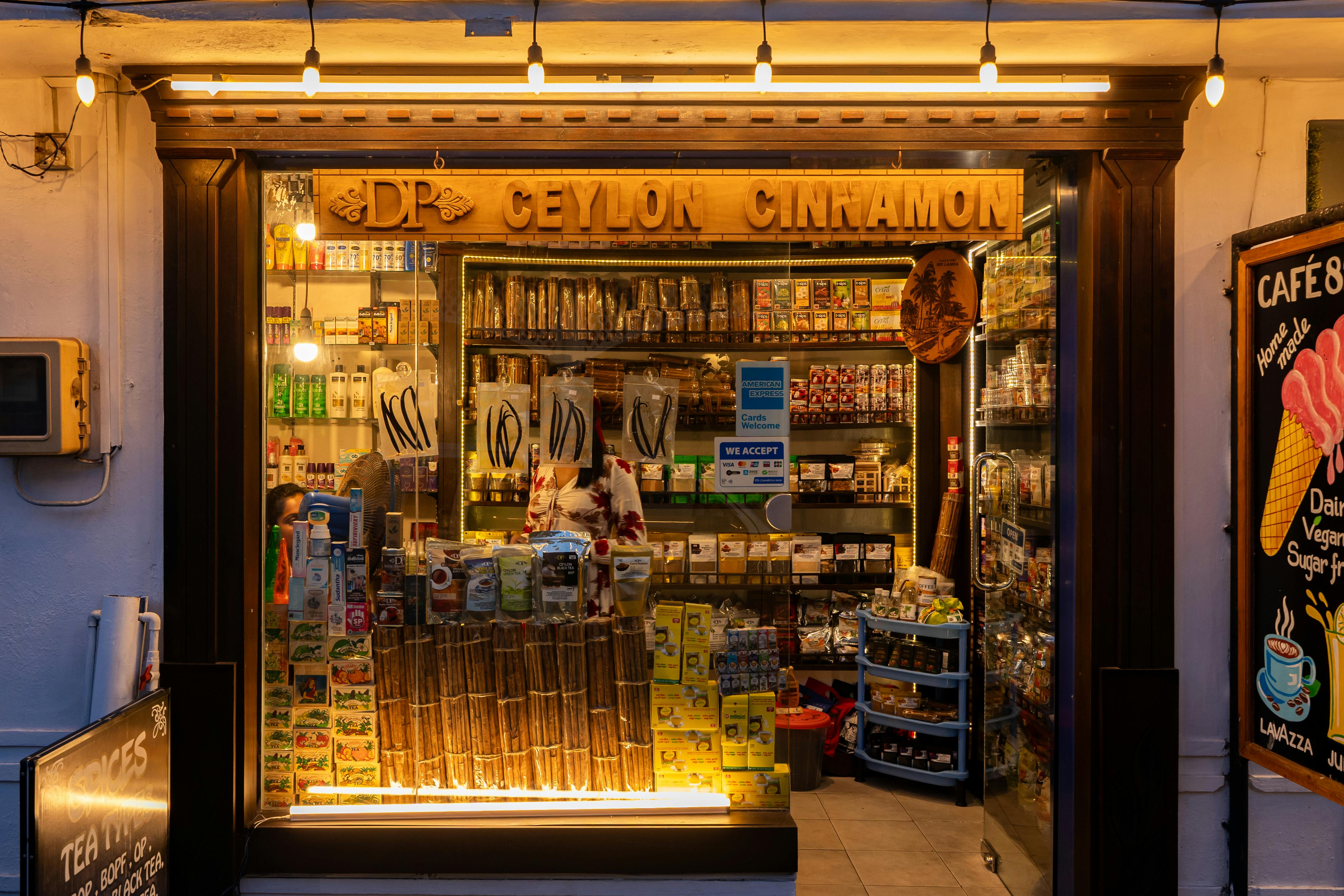 A row of palm trees sitting on top of a sandy beach