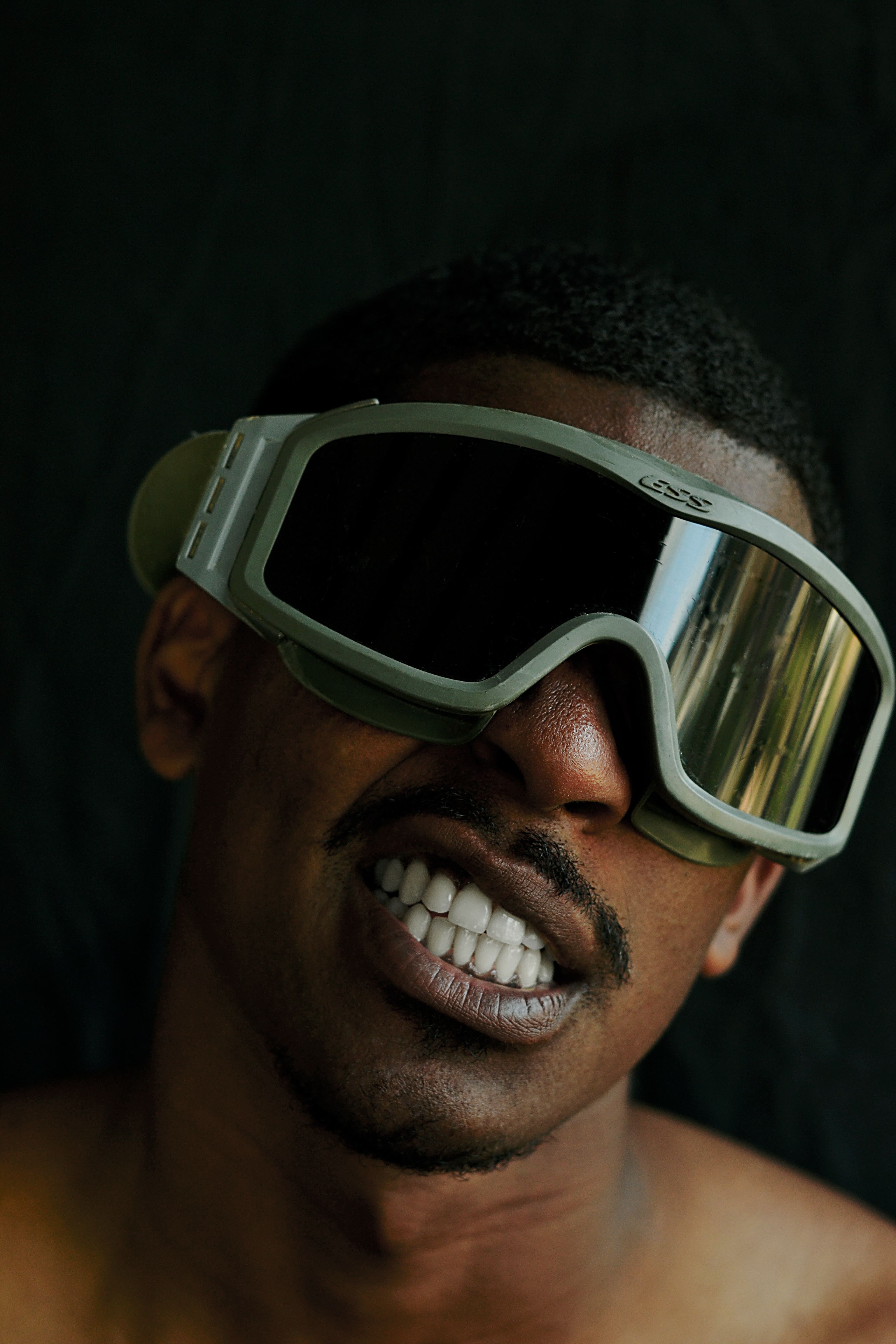 A man with goggles on his face · Free Stock Photo