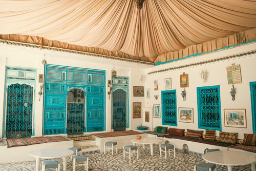 Free A stunning Moroccan interior with intricate blue doors and traditional decor in Tunis. Stock Photo