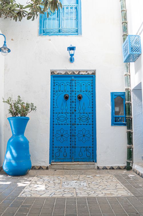 Free Vibrant blue traditional door in Carthage, Tunisia, showcasing Islamic architecture. Stock Photo