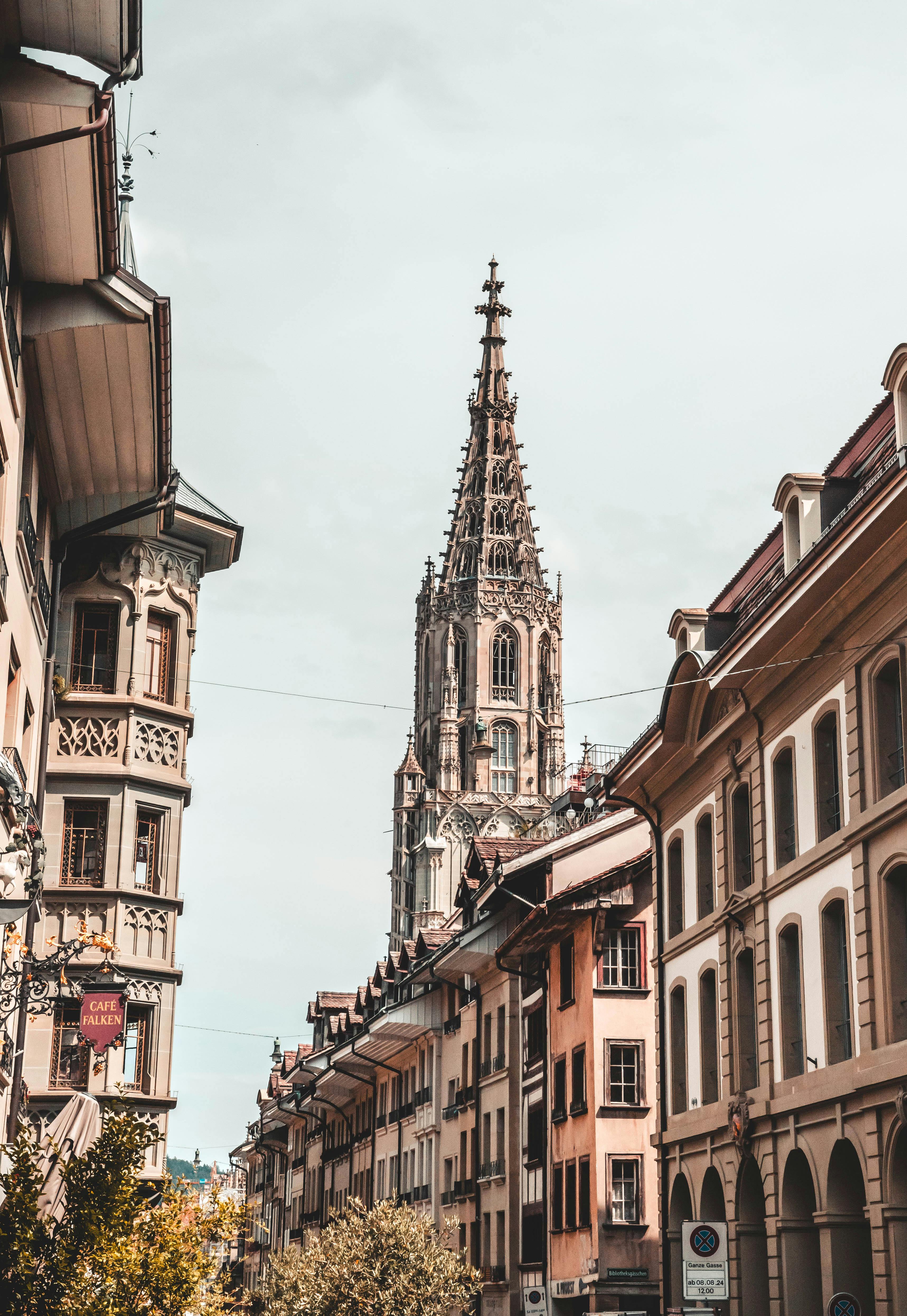 Historic Bern cityscape showcasing Gothic architecture with a prominent cathedral tower.