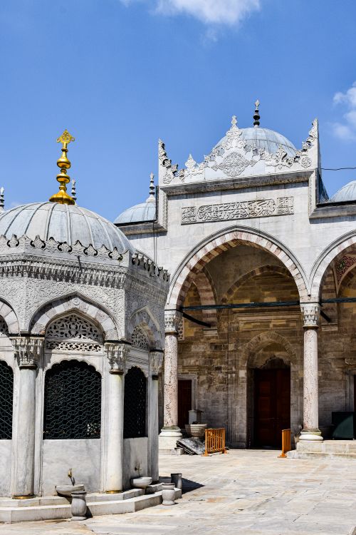 Free A view of stunning Ottoman architecture in Istanbul, featuring intricate arches and domes. Stock Photo