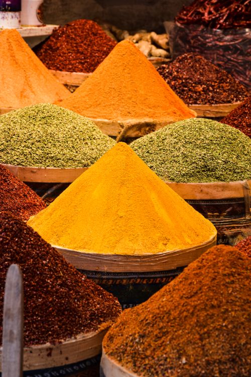Free A colorful array of spices displayed in a traditional Istanbul market, showcasing rich flavors and textures. Stock Photo