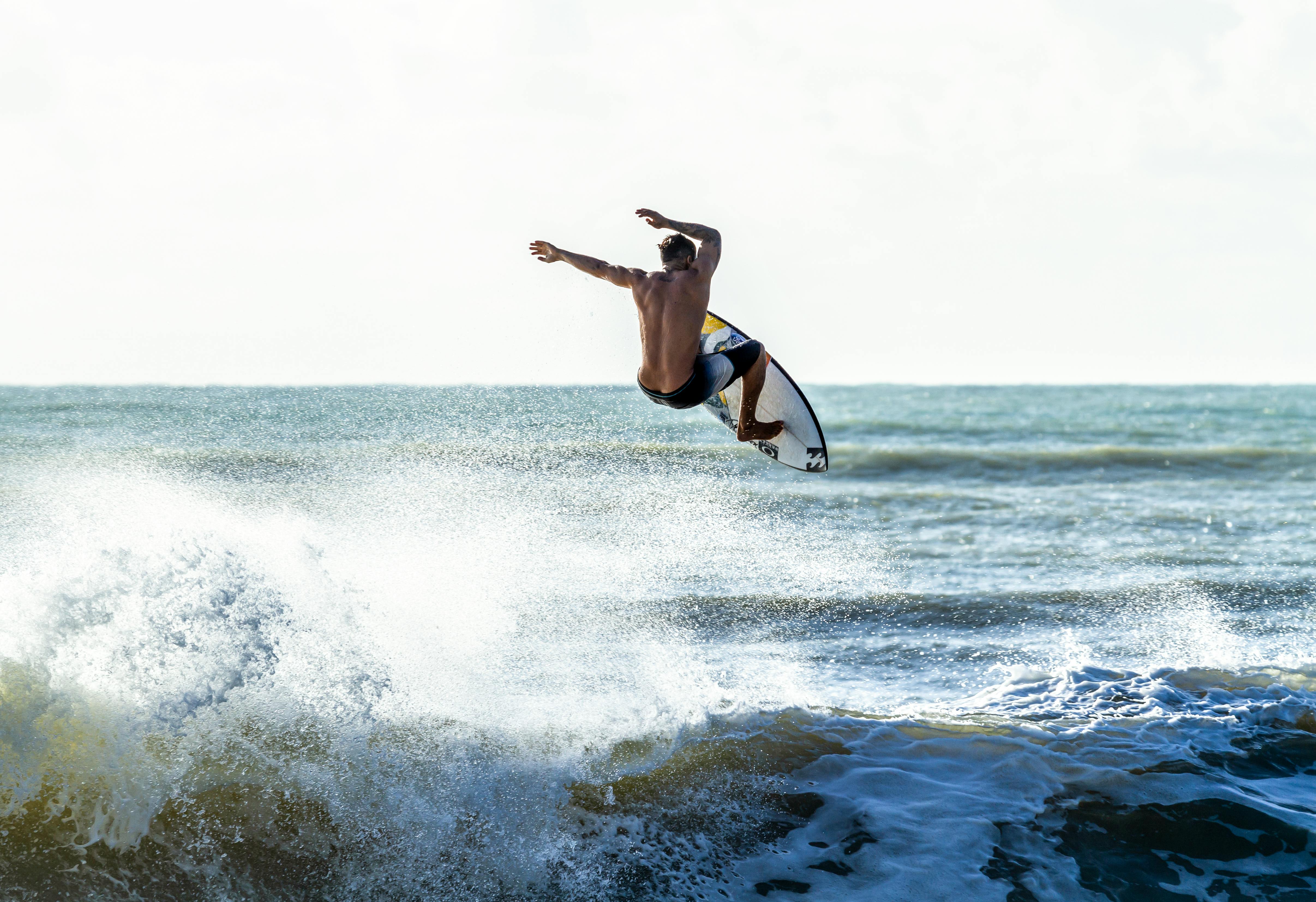 Man on Surfboard · Free Stock Photo
