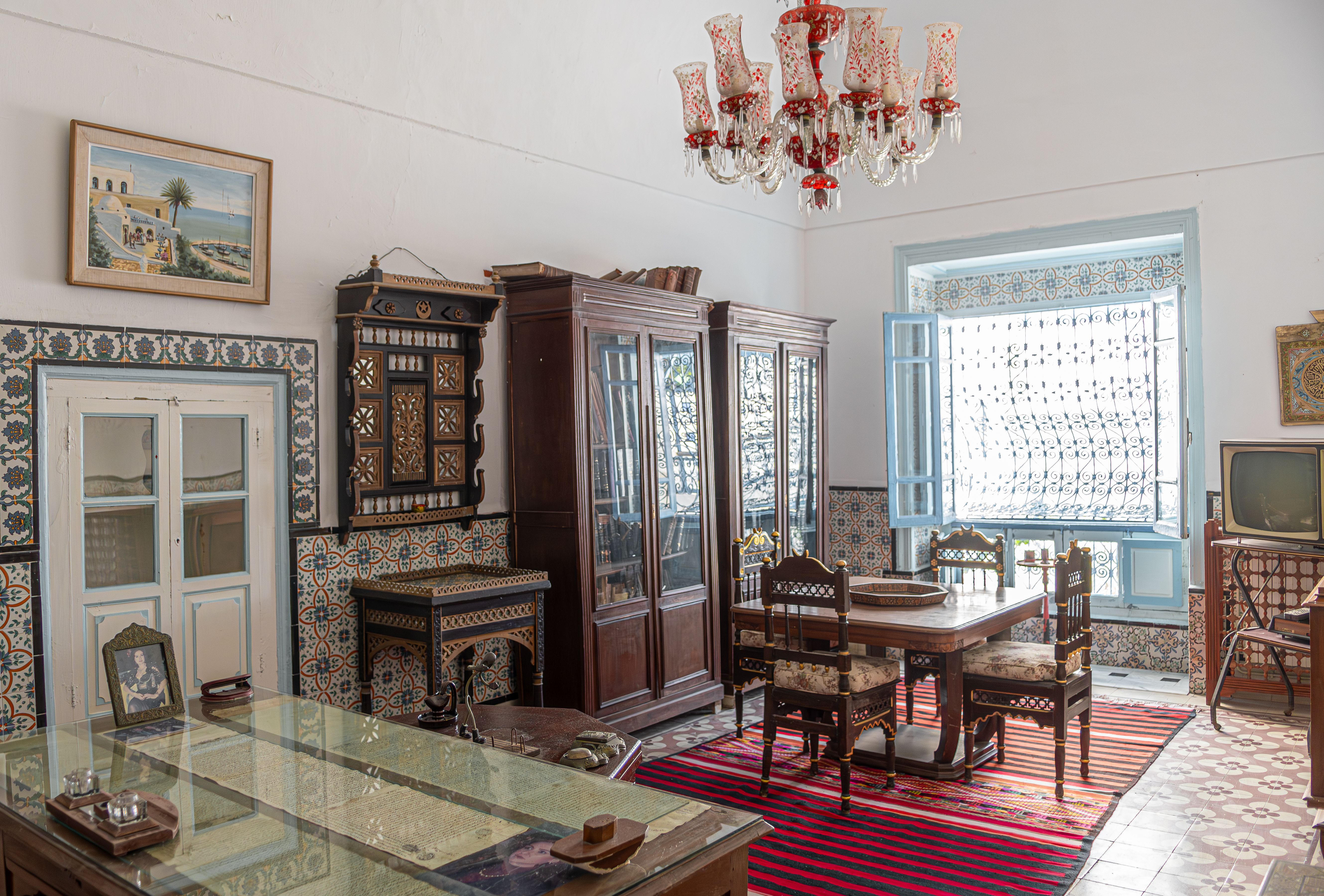Elegant interior showcasing traditional Tunisian decor and vintage furniture in Carthage.