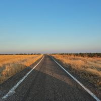 Empty country road at sunset, photo by Ferhan Sultan Karaman on Pexels