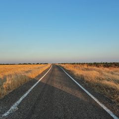 Empty country road at sunset — photo by Ferhan Sultan Karaman on Pexels