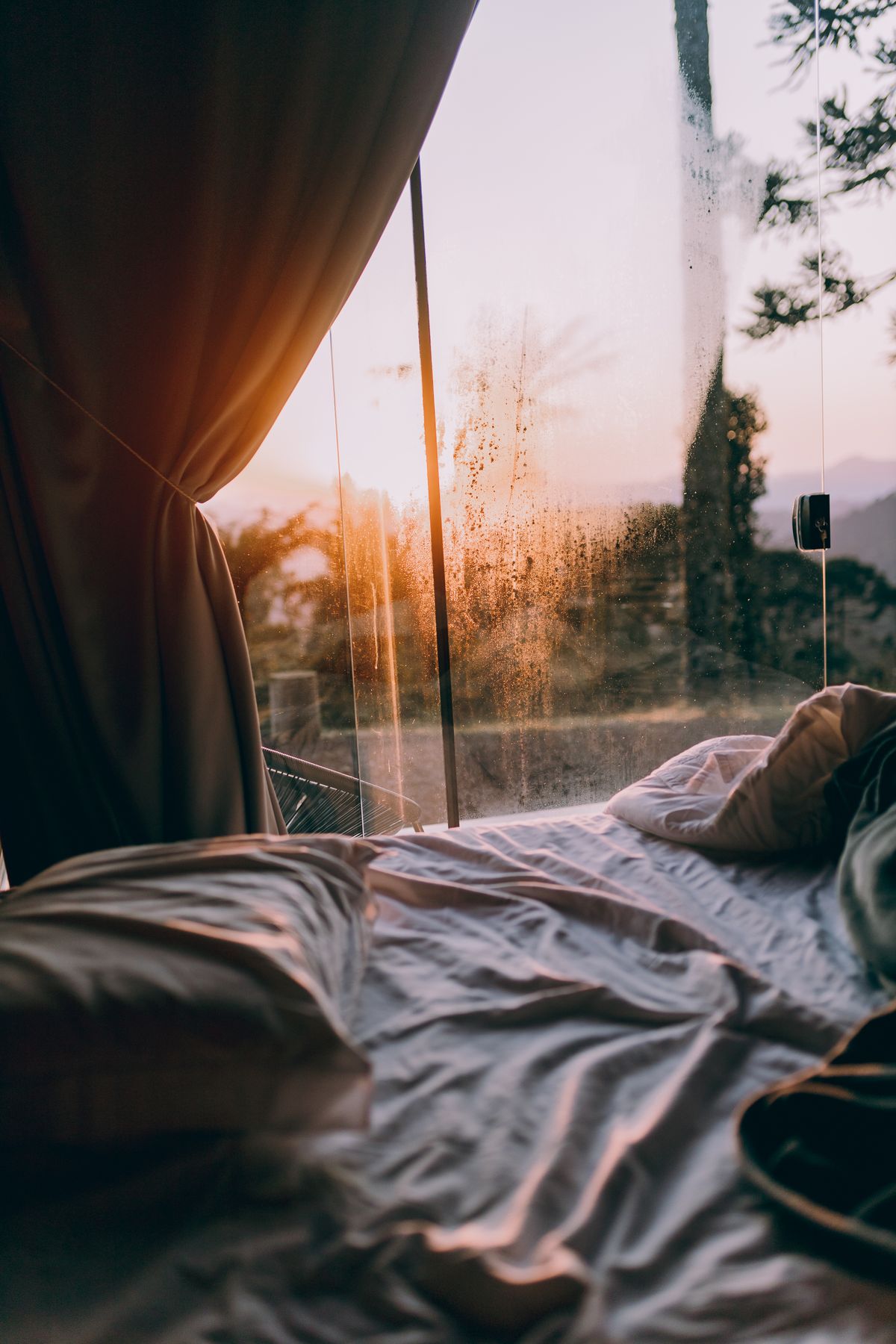 Morning sunlight pouring through a camper van window