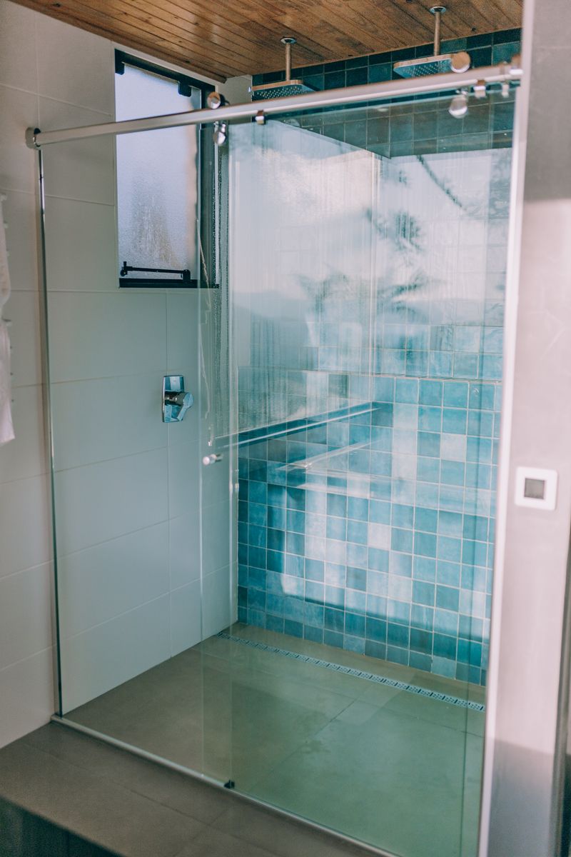 Luxury Glass Enclosures - Frameless glass shower door installation example