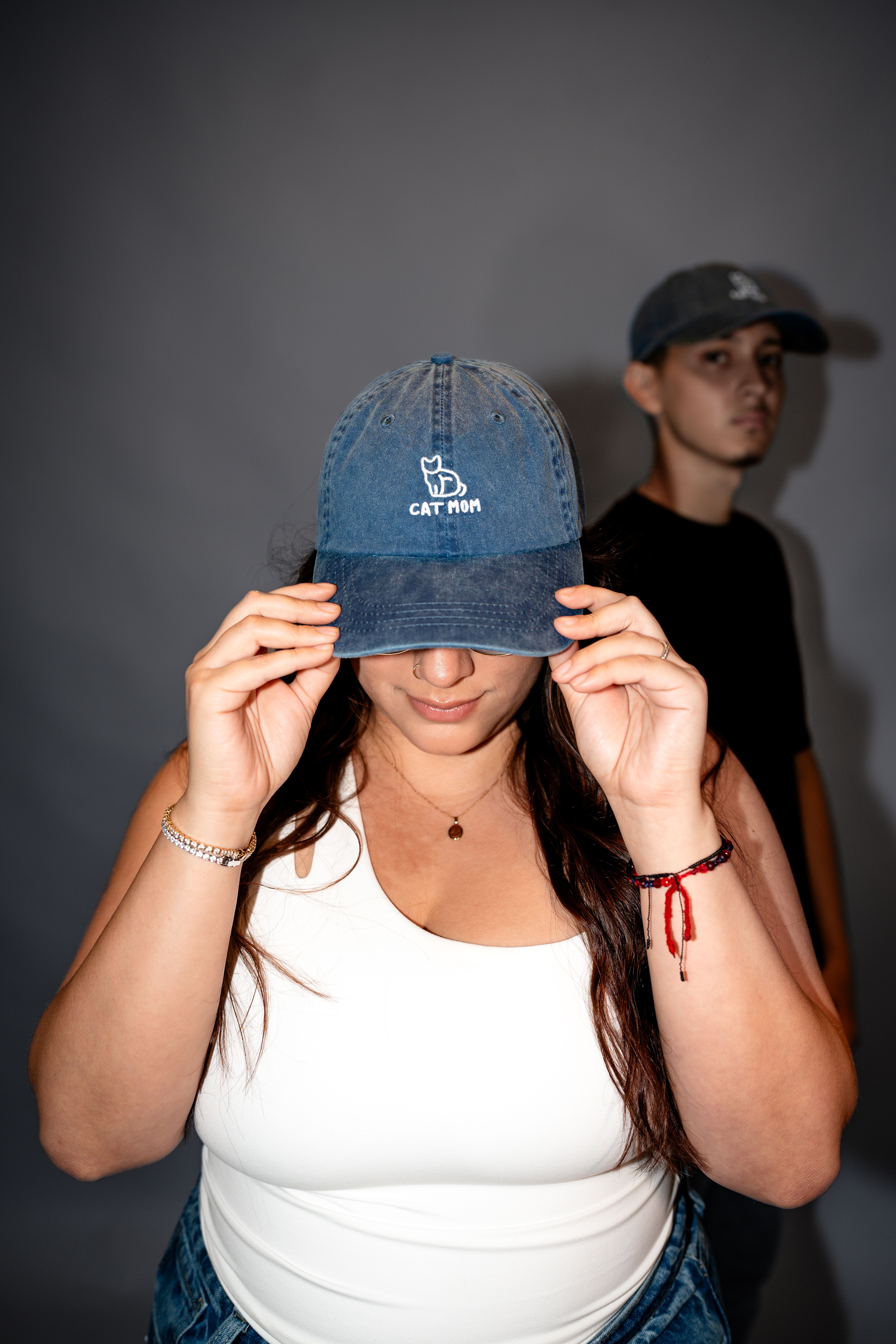 A woman and a man are wearing hats · Free Stock Photo