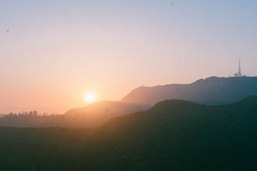 Scenic View Of Mountains During Dawn