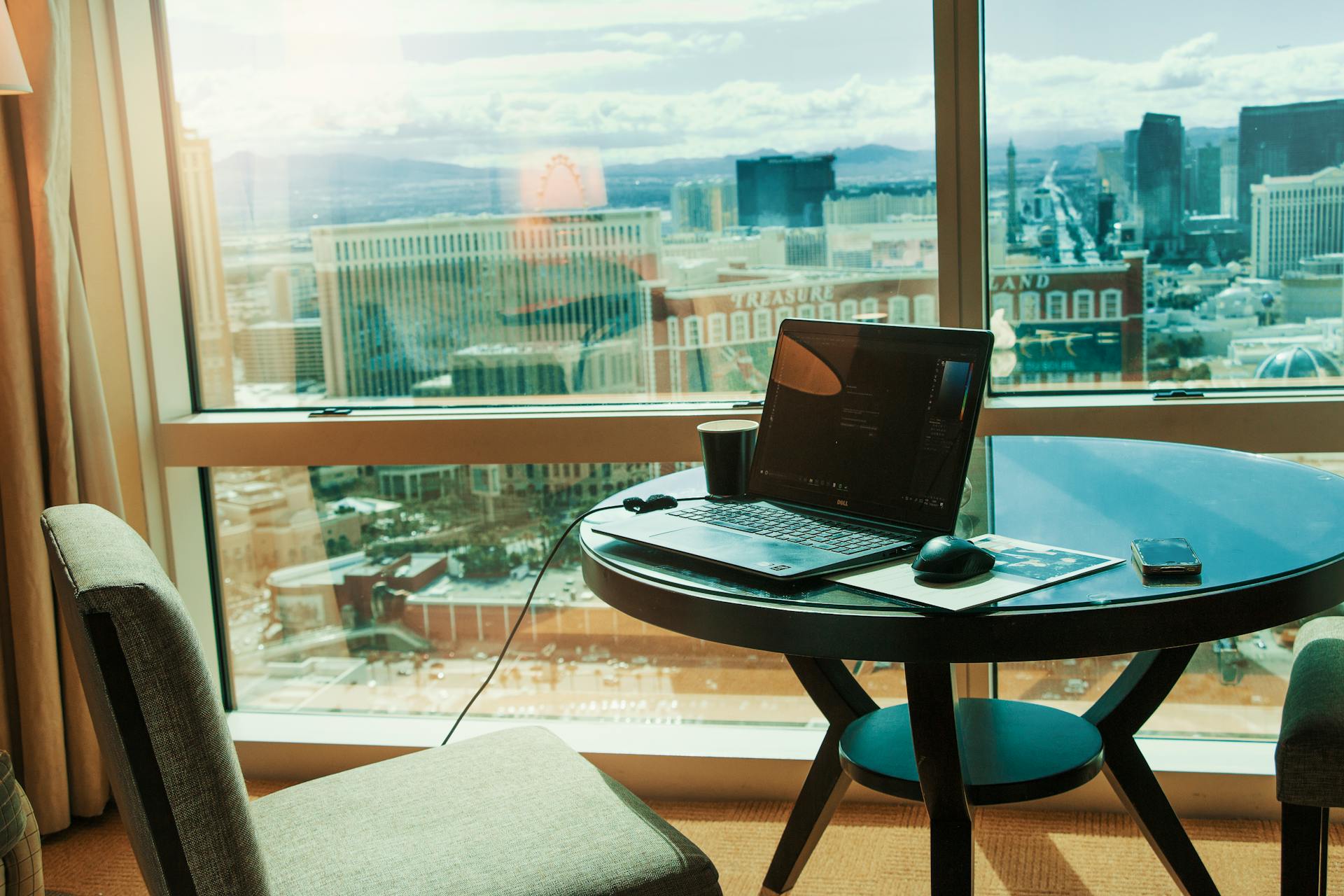Experience a luxurious Las Vegas workspace with city skyline views through the window.