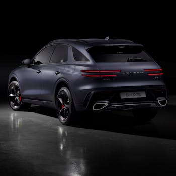 Elegant black SUV captured in a studio setting showcasing luxury design.