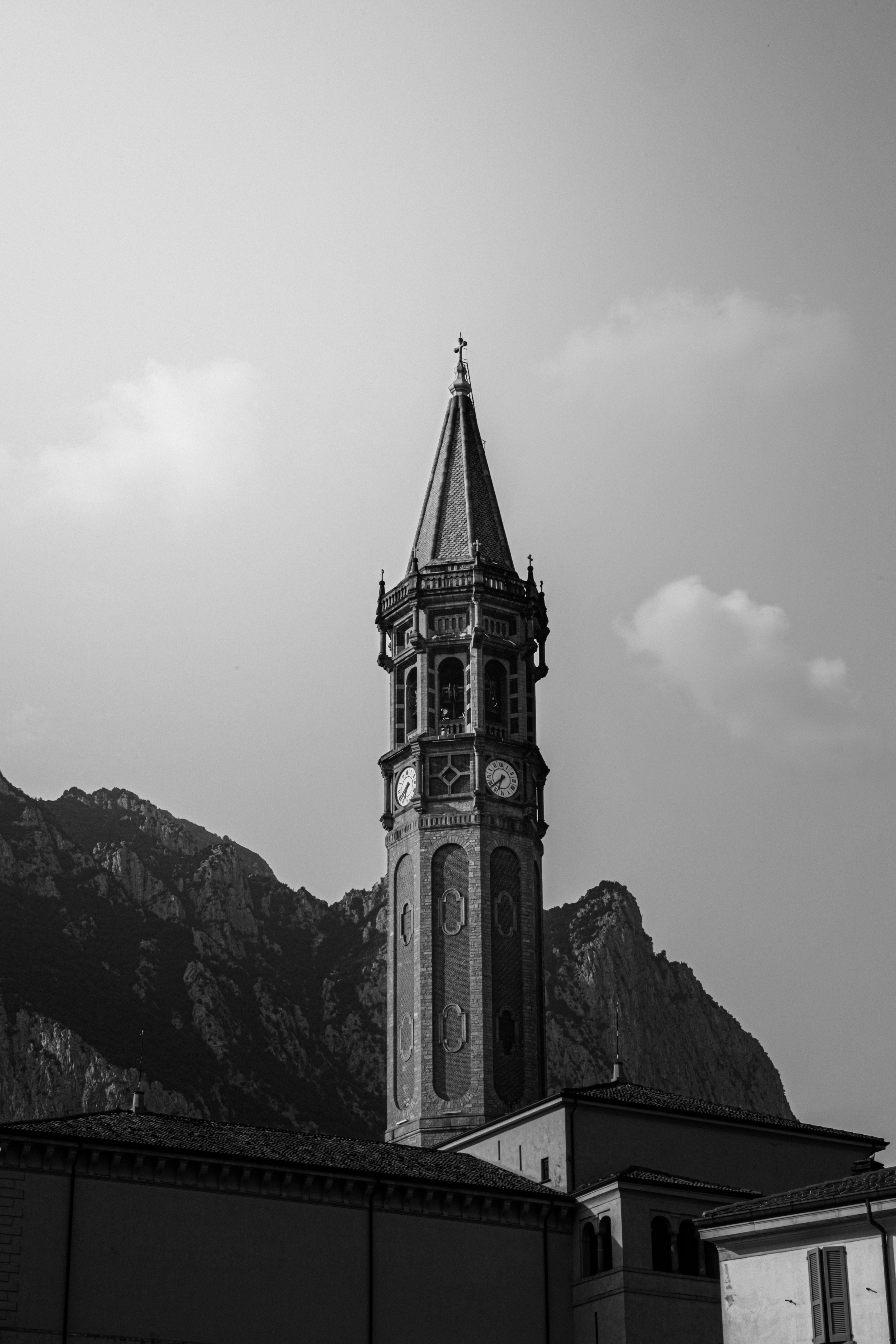 A black and white photo of a clock tower · Free Stock Photo