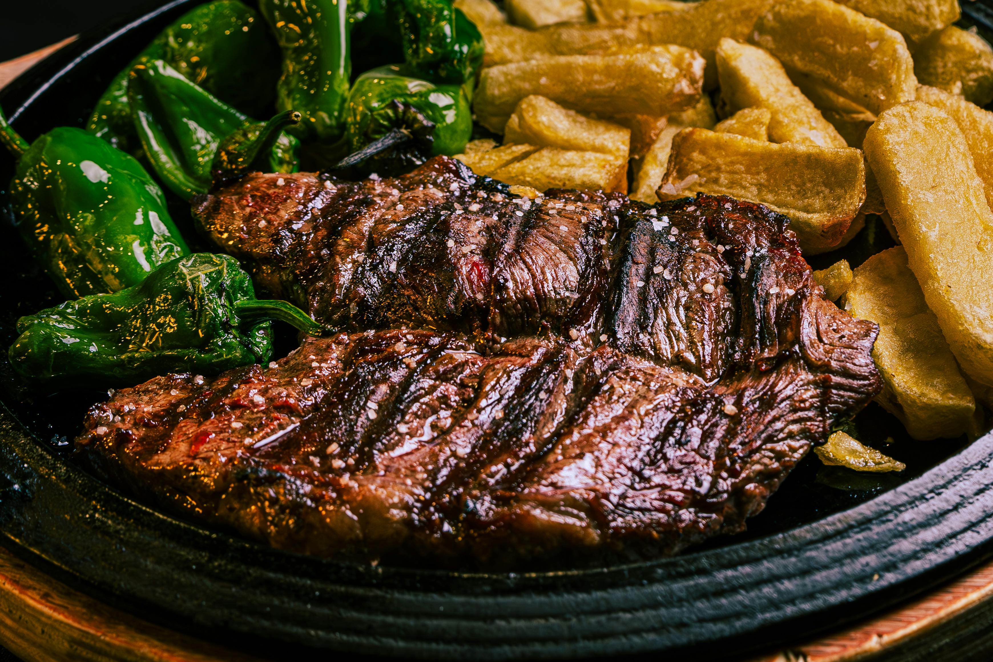 free-photo-of-a-plate-of-steak-and-fries-with-green-peppers.jpeg?auto=compress\u0026cs=tinysrgb\u0026w=1600\u0026loading=lazy