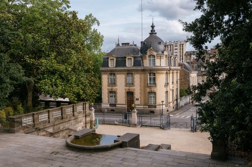 Free Elegant 19th-century building with garden in the heart of Rennes, France, showcasing classic architecture. Stock Photo