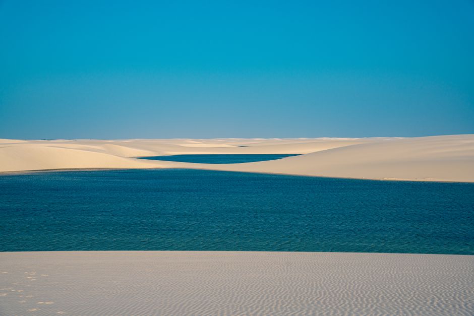 White sand dunes with crystal clear blue lagoons in Lençóis Maranhenses National Park