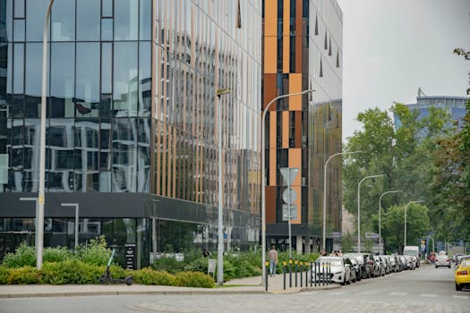 Contemporary office architecture with glass reflections in Wrocław, Poland.