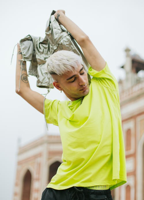 Free Photo of Man Wearing Neon Green Shirt Stock Photo