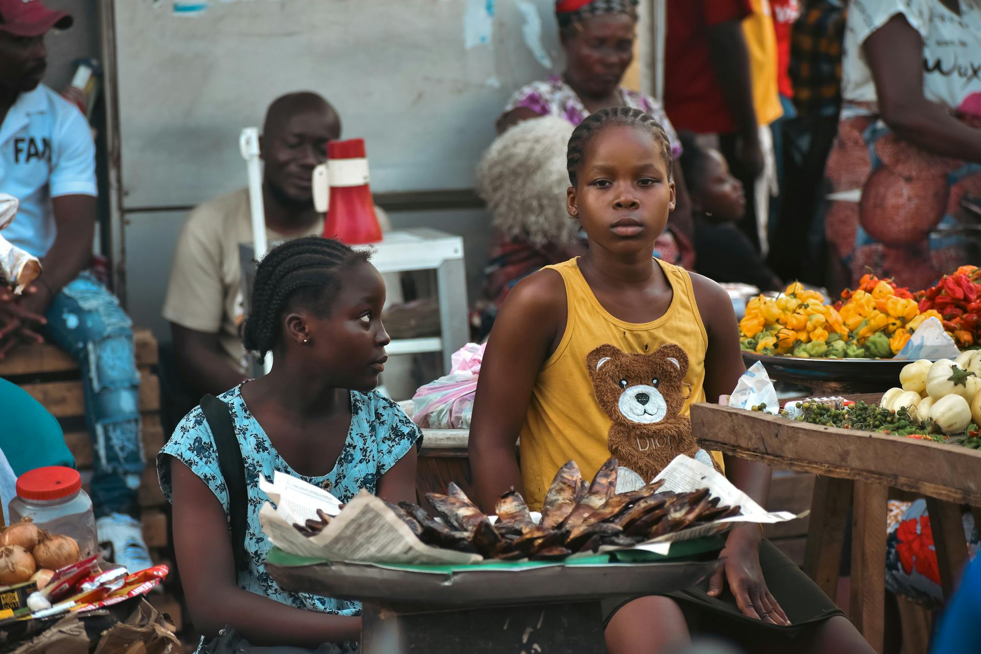 A bustling market scene in Monrovia showcasing local vendors and vibrant produce.