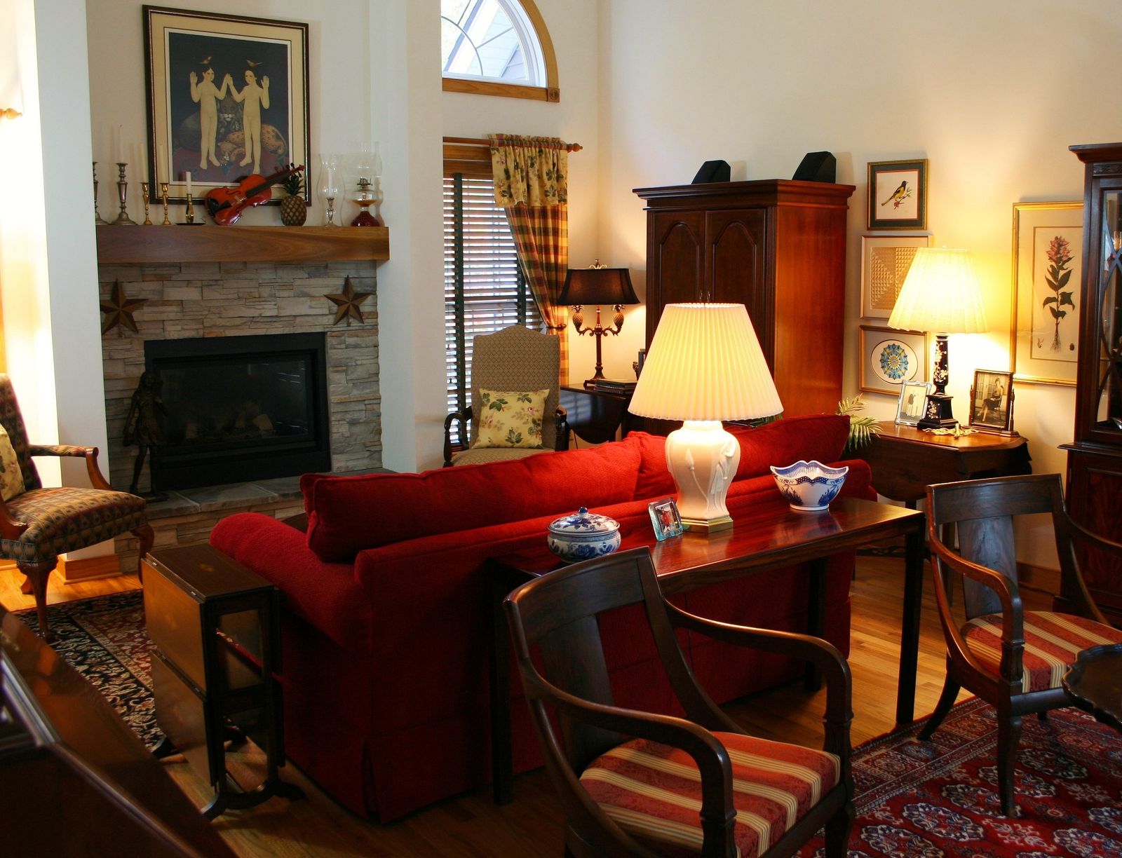 A classic living room with a fireplace, showing how small decor pieces complete a traditional room.