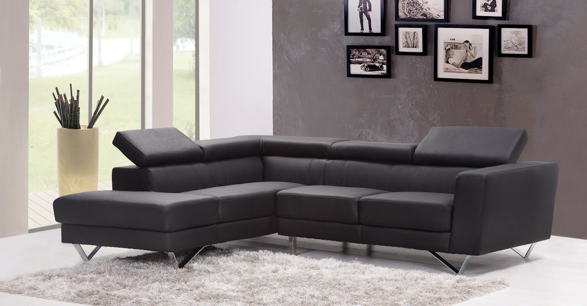 Black Fabric Sectional Sofa Near Glass Window