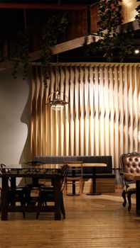 Luxurious interior with modern furniture and ambient lighting, featuring a stylish wall design.