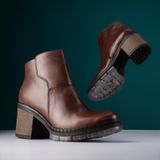 Brown leather ankle boots — photo by José Martin Segura Benites on Pexels