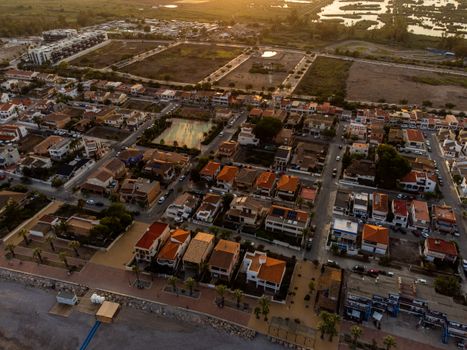 A stunning aerial view of a suburban area in Casablanca, VC, Spain during sunset.