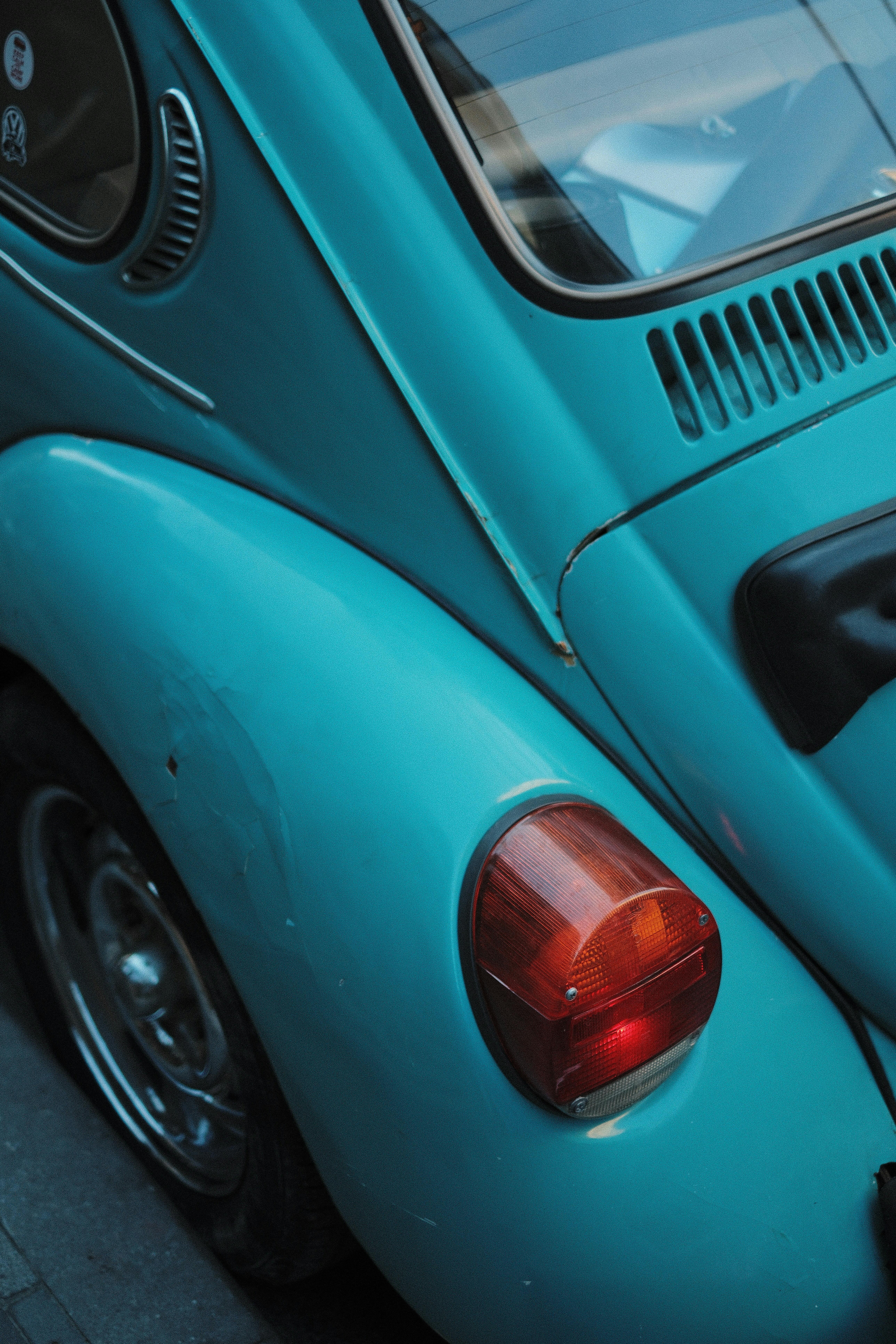 Close-up of a vintage blue car parked in Beyoğlu, Istanbul, showcasing classic design elements.