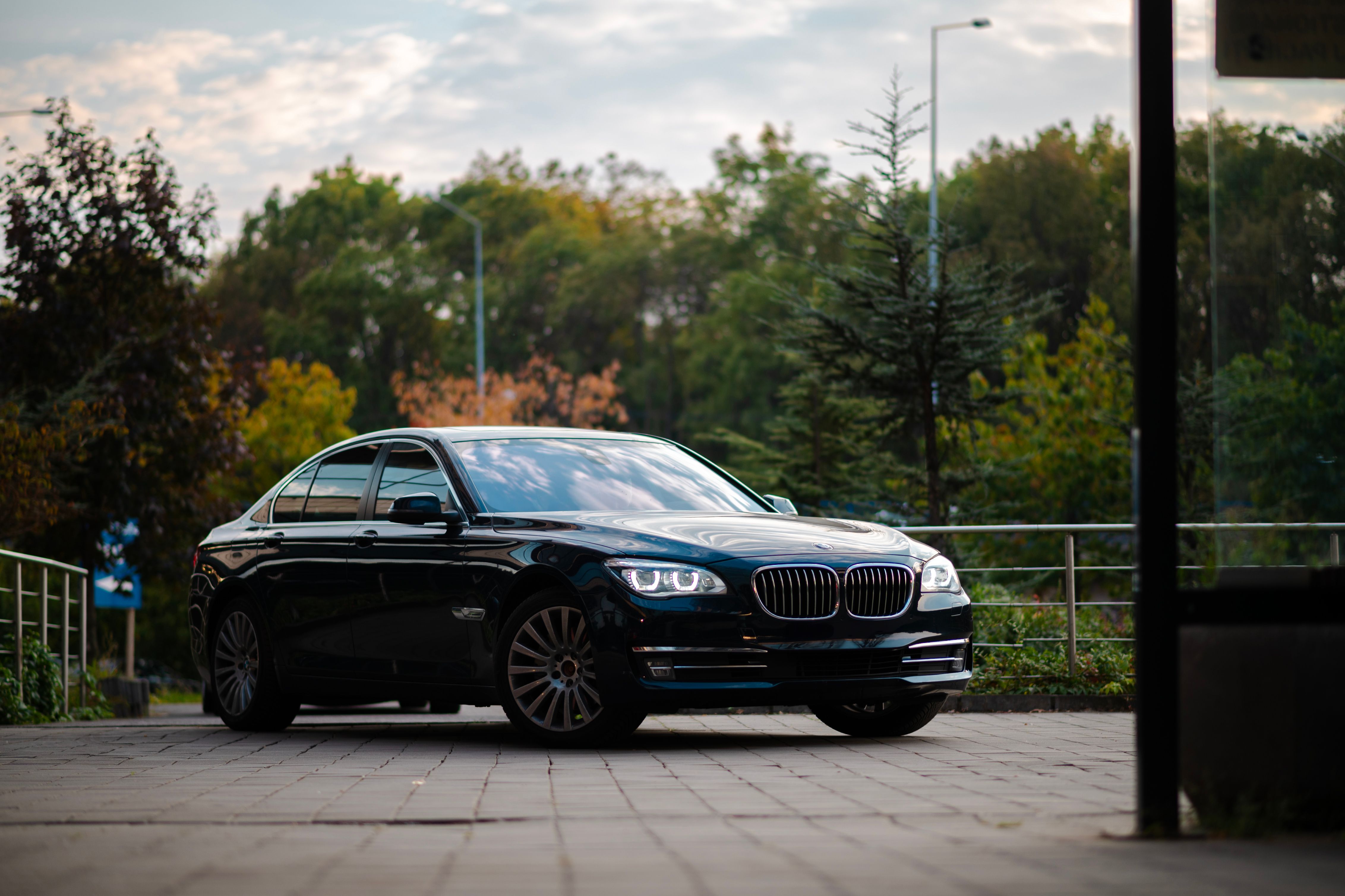 A Black BMW Car Parked on the Road · Free Stock Photo