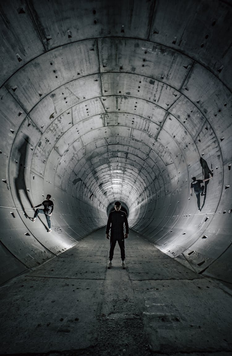 People In A Tunnel 