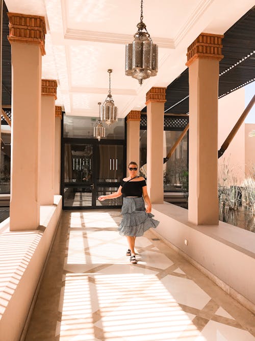 Woman Standing Inside Structure